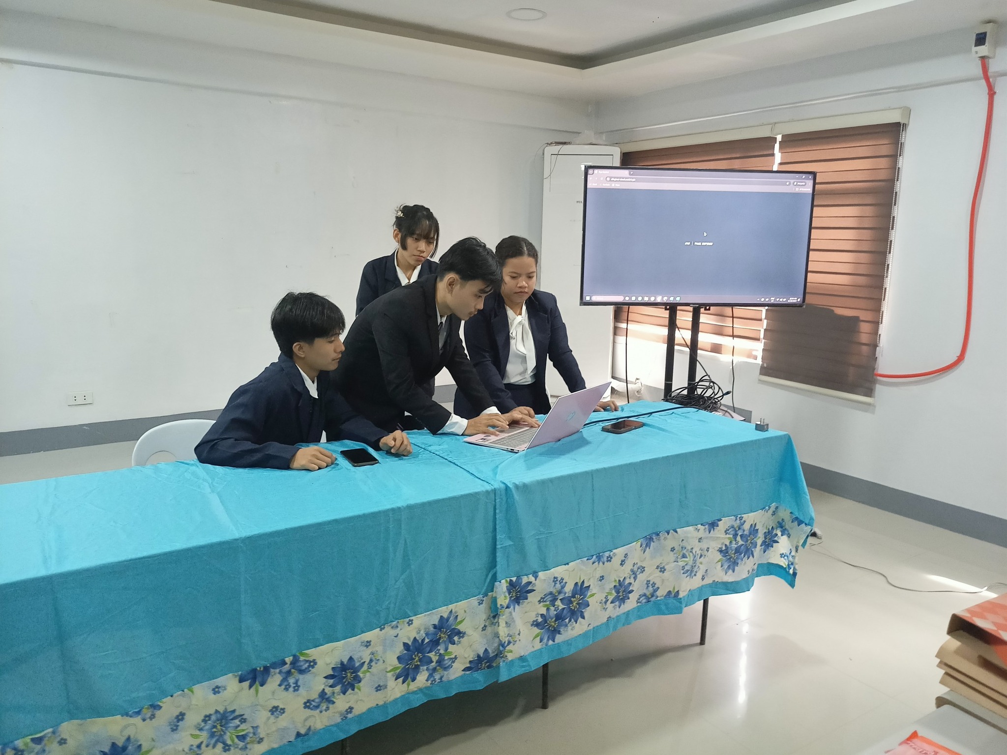 Juan Teodoro N. De Vera leading a capstone defense presentation